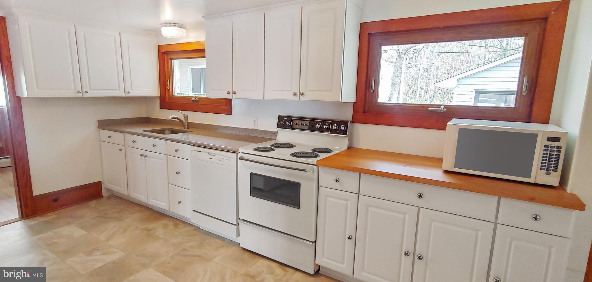 18211 River Road Tall Timbers, MD 20690 - Photo 9 of 60 Bright Kitchen on East Side of Home