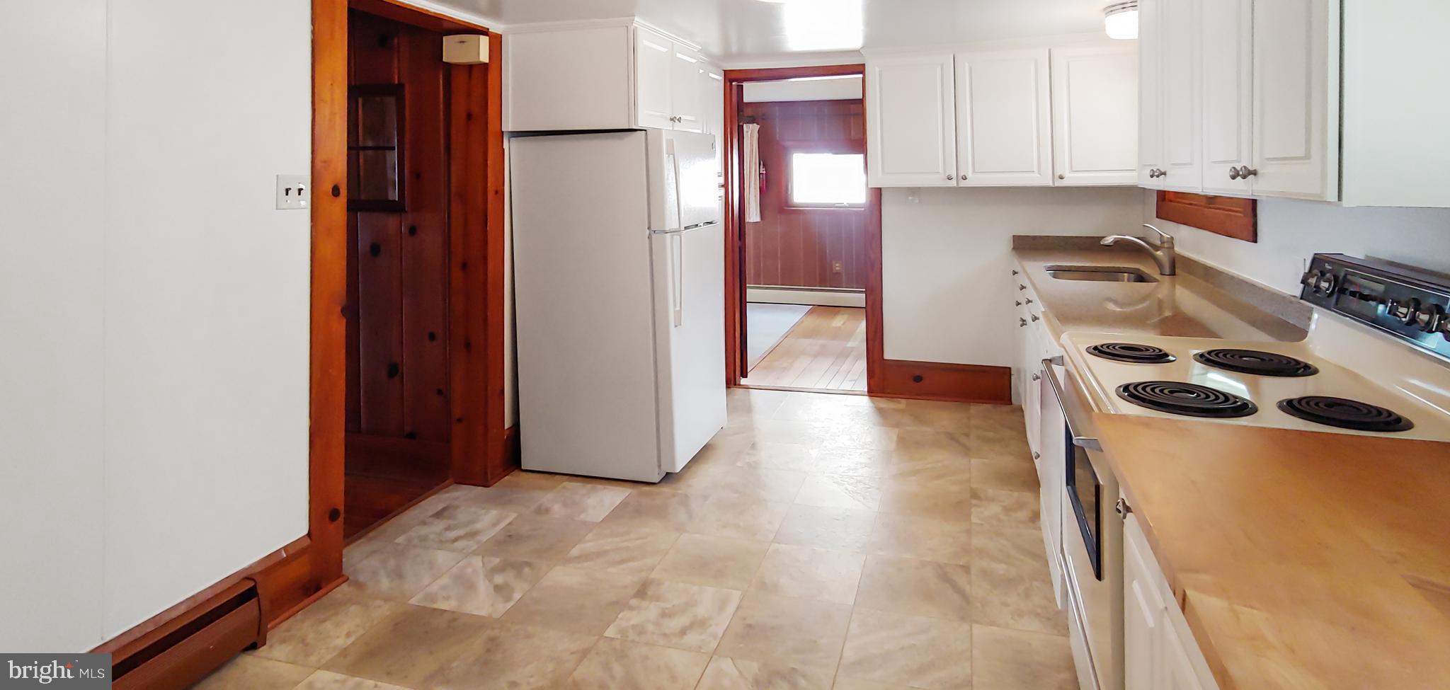 18211 River Road Tall Timbers, MD 20690 - Photo 10 of 60 Bright Kitchen on East Side of Home