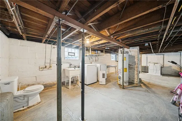 a view of a room with wooden walls