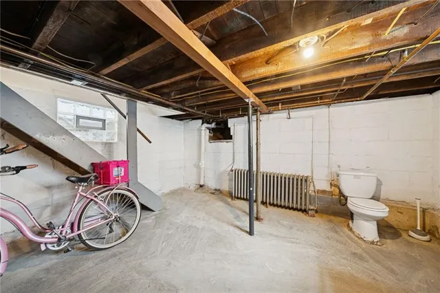 a view of a room with wooden walls