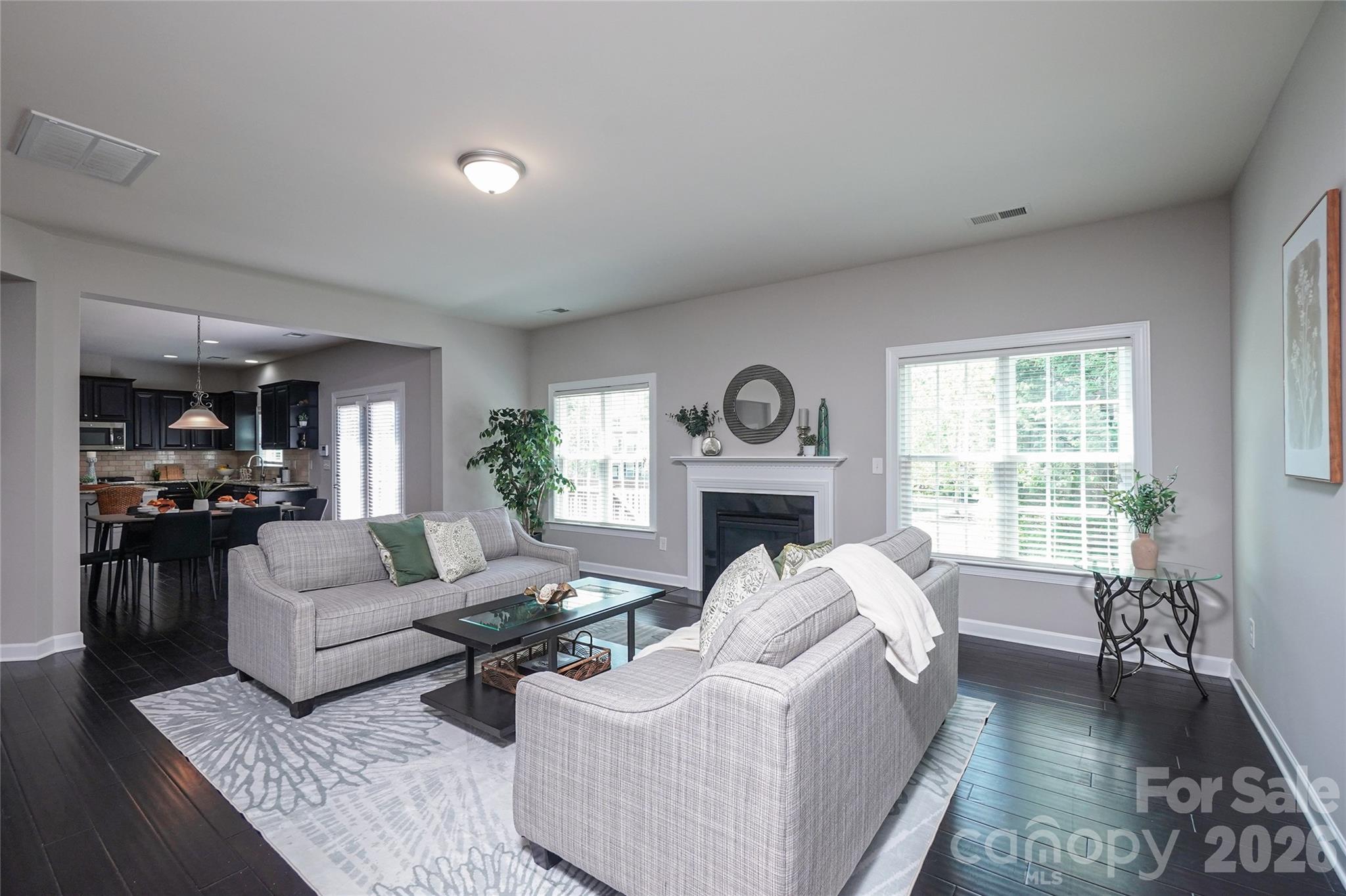 4008 Oxford Mill Road Waxhaw, NC 28173 - Photo 18 of 44 a living room with furniture and a fireplace