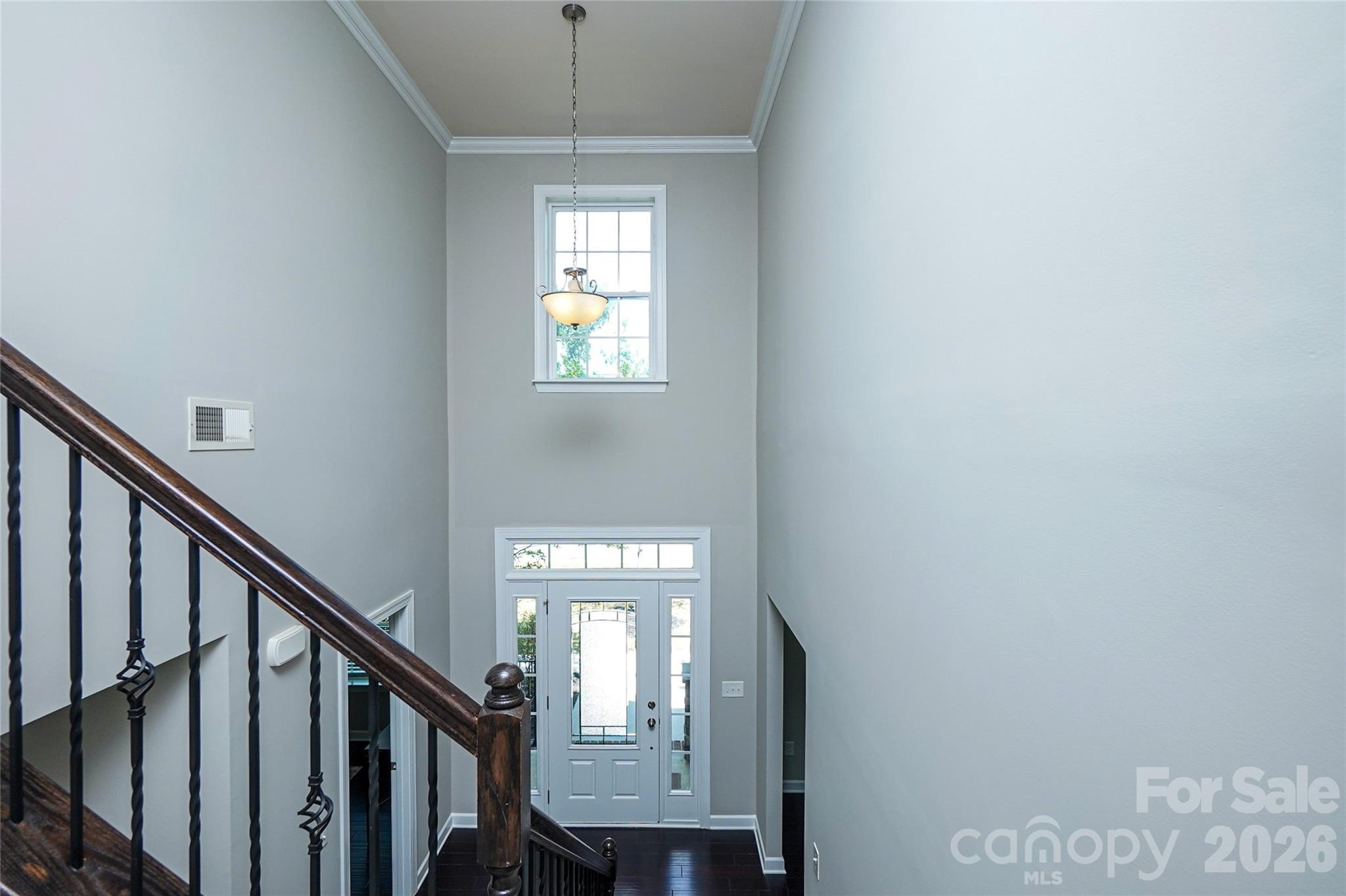 4008 Oxford Mill Road Waxhaw, NC 28173 - Photo 22 of 44 a view of a hallway with windows
