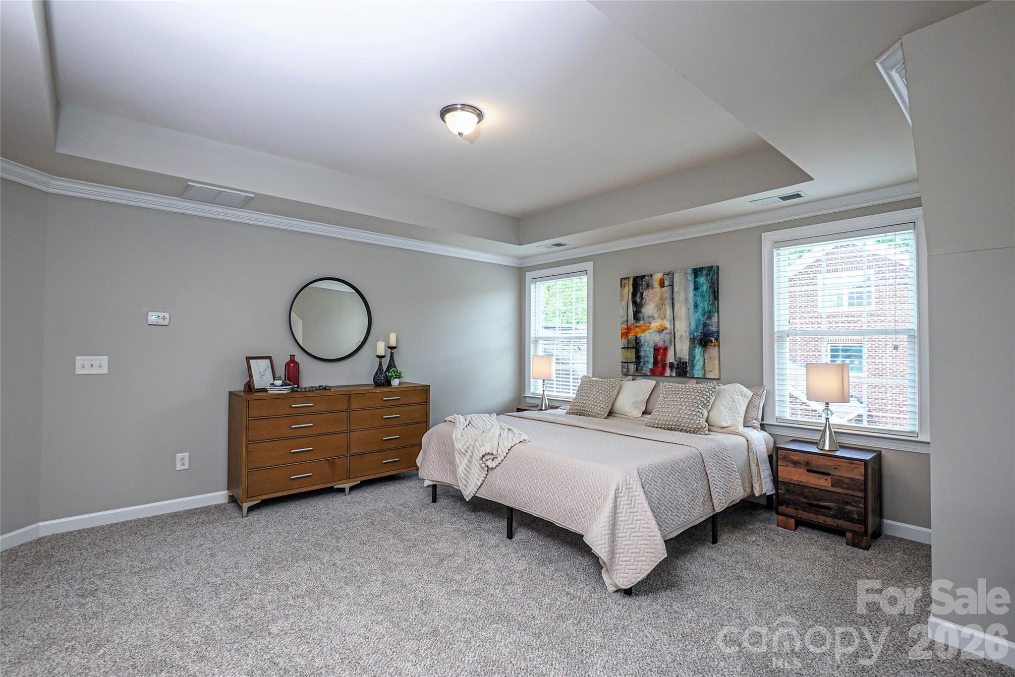 4008 Oxford Mill Road Waxhaw, NC 28173 - Photo 24 of 44 a bedroom with a bed and windows