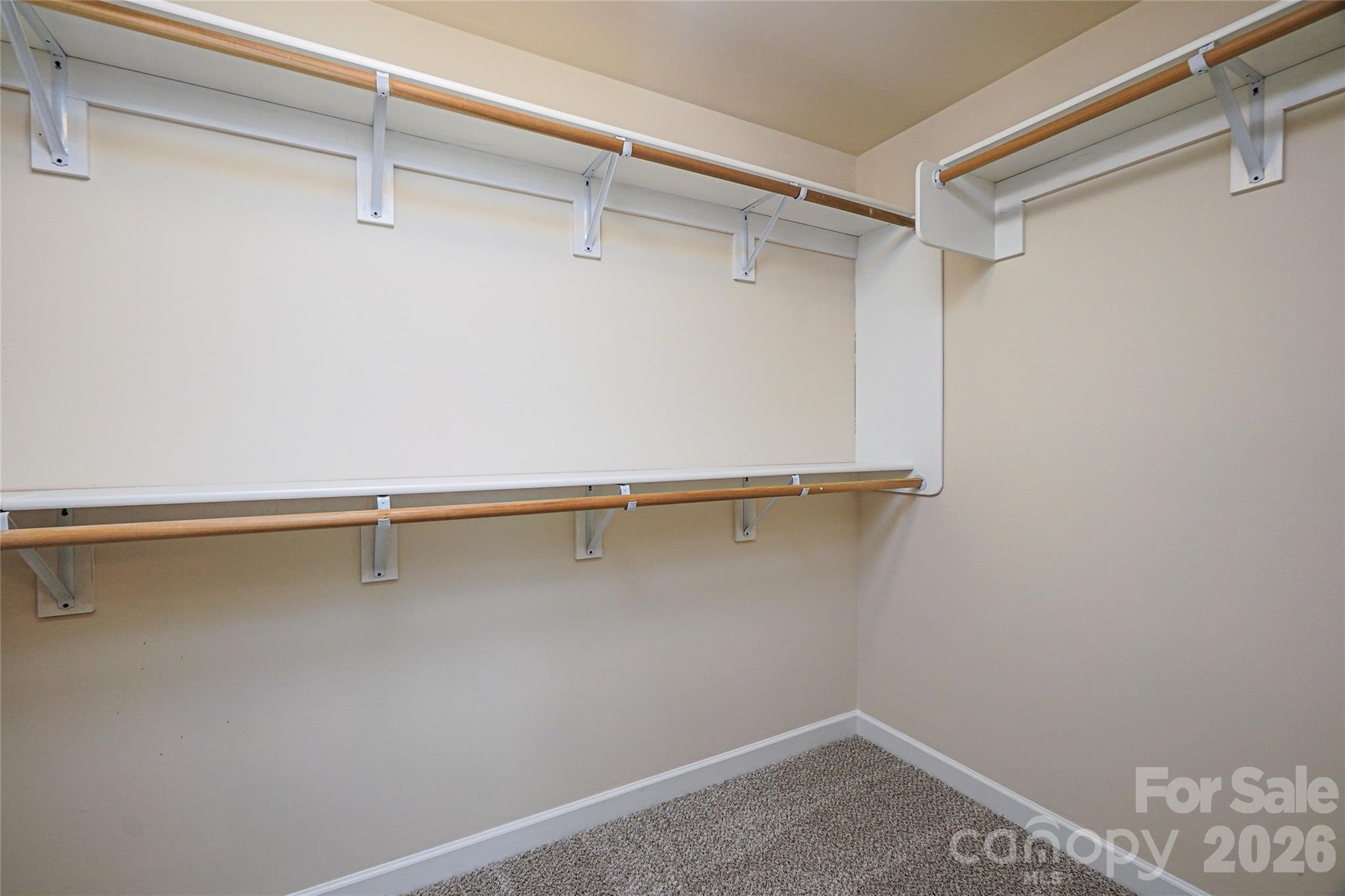 4008 Oxford Mill Road Waxhaw, NC 28173 - Photo 29 of 44 a view of a room with racks on the wall
