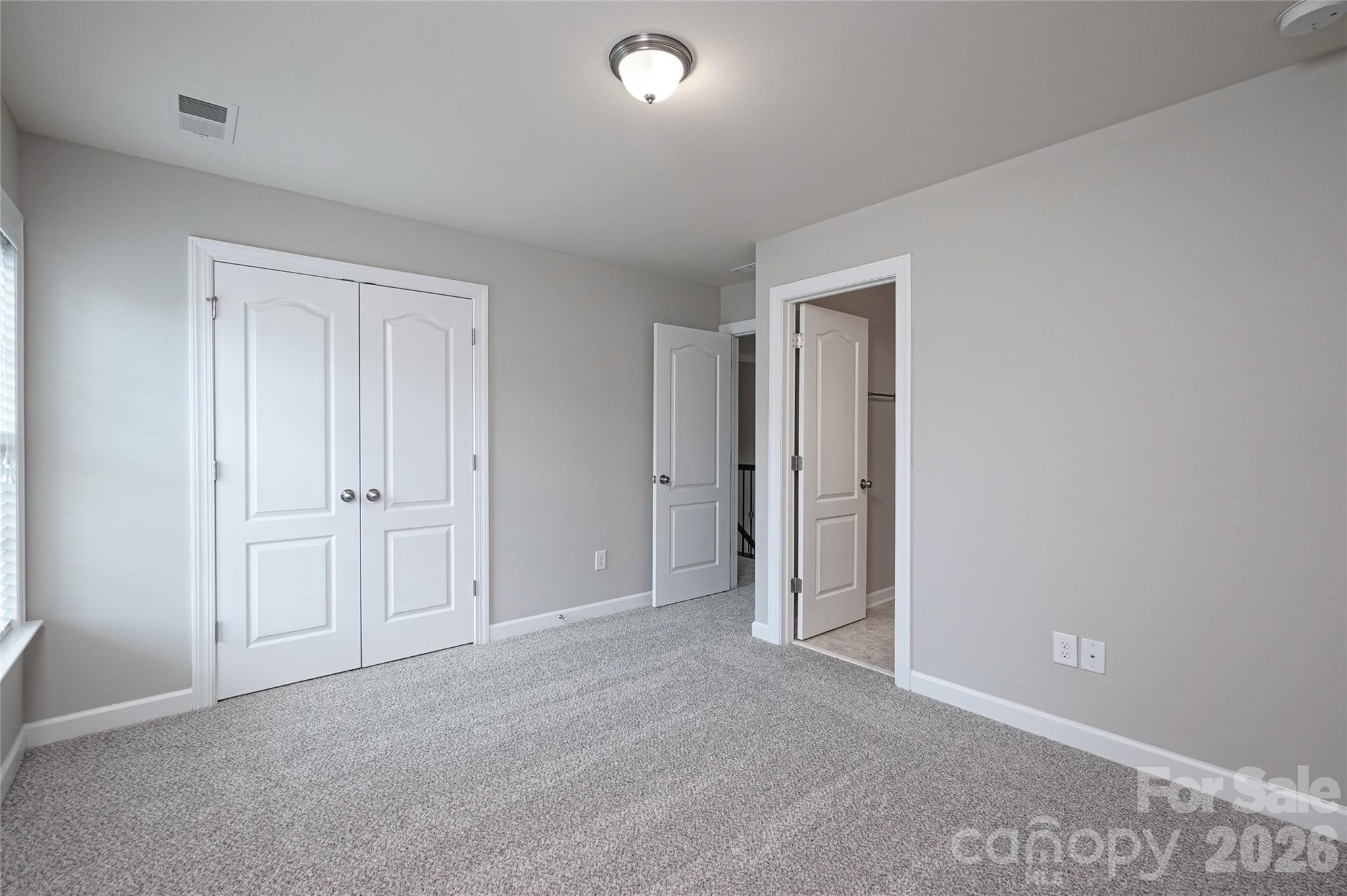 4008 Oxford Mill Road Waxhaw, NC 28173 - Photo 35 of 44 a view of an empty room and closet area