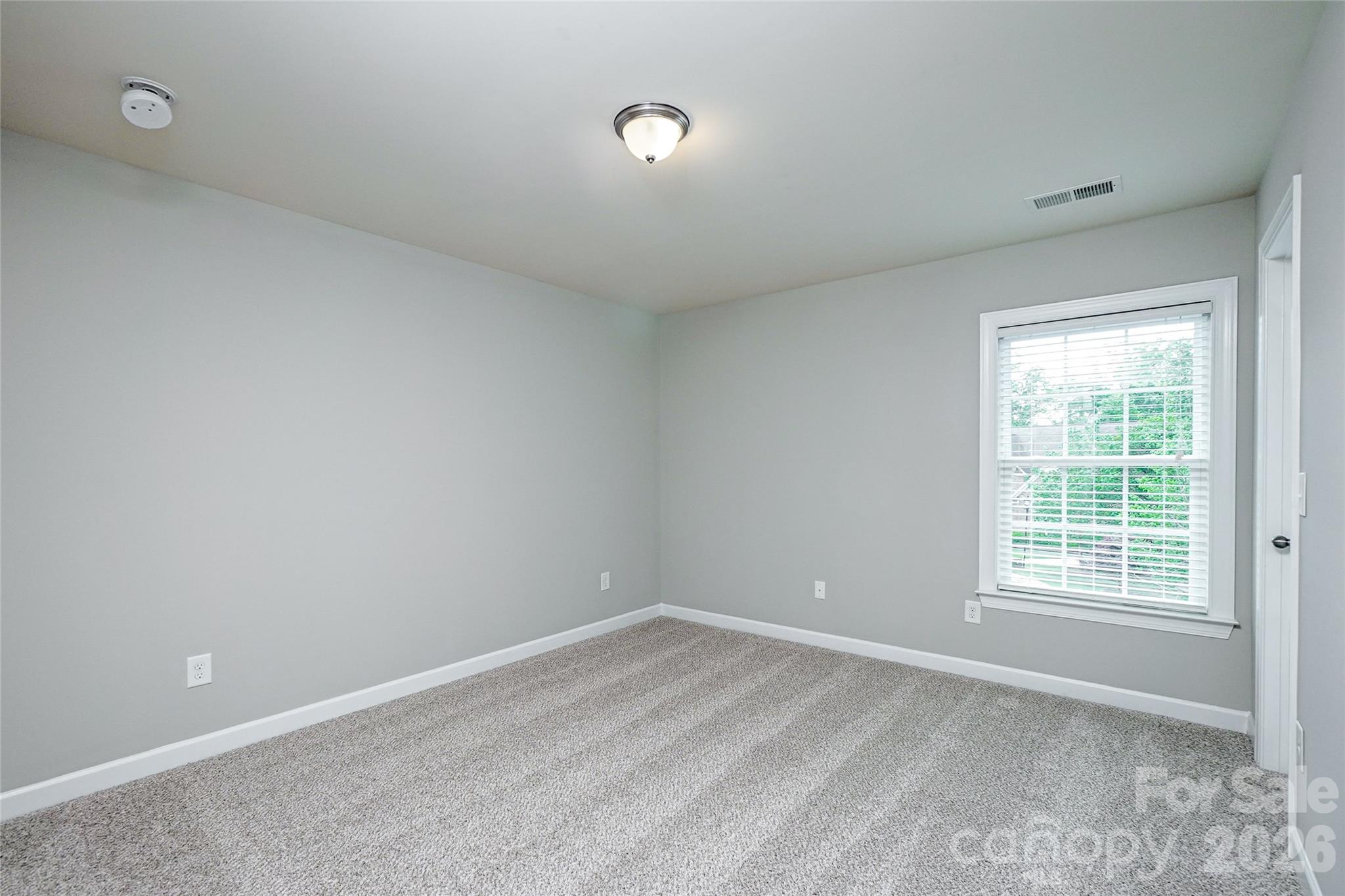 4008 Oxford Mill Road Waxhaw, NC 28173 - Photo 38 of 44 an empty room with a window