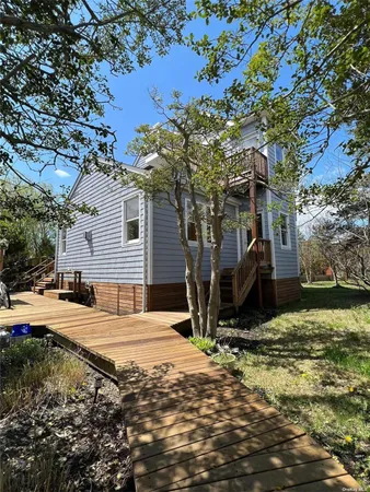 a view of a backyard of the house