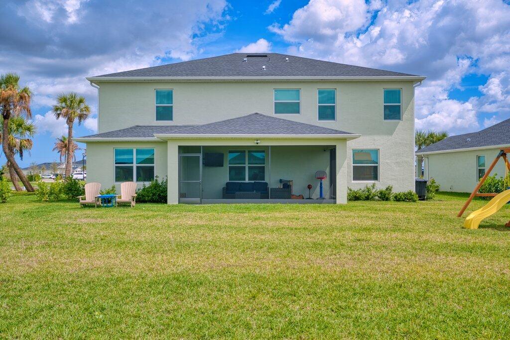 12328 Southwest Roma Circle Port St. Lucie, FL 34987 - Photo 60 of 72 Rear Exterior Close.jpeg-SMALL