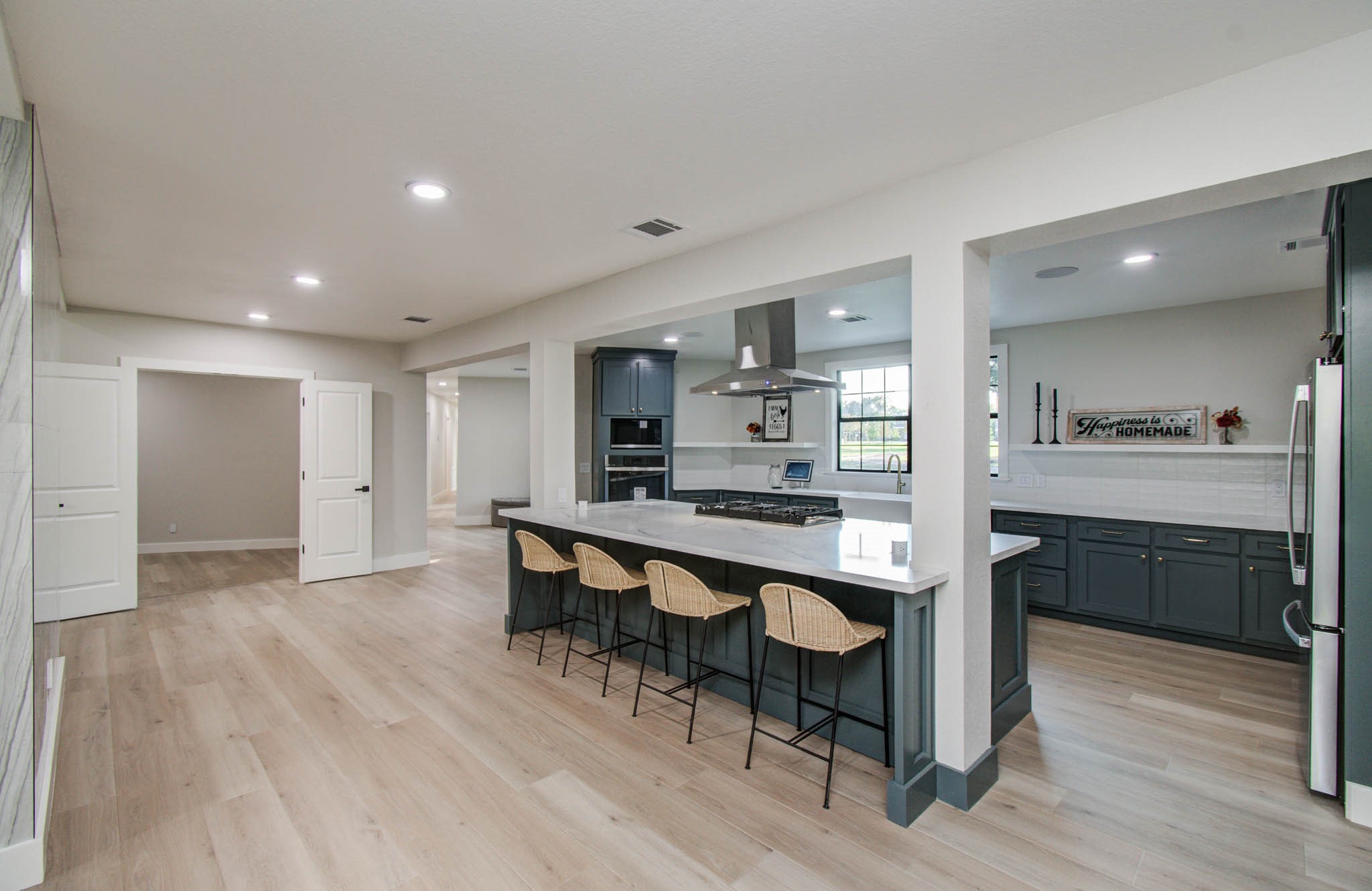 116 Laughlin Road Eagle Lake, TX 77434 - Photo 11 of 41 a large kitchen with a table and chairs in it