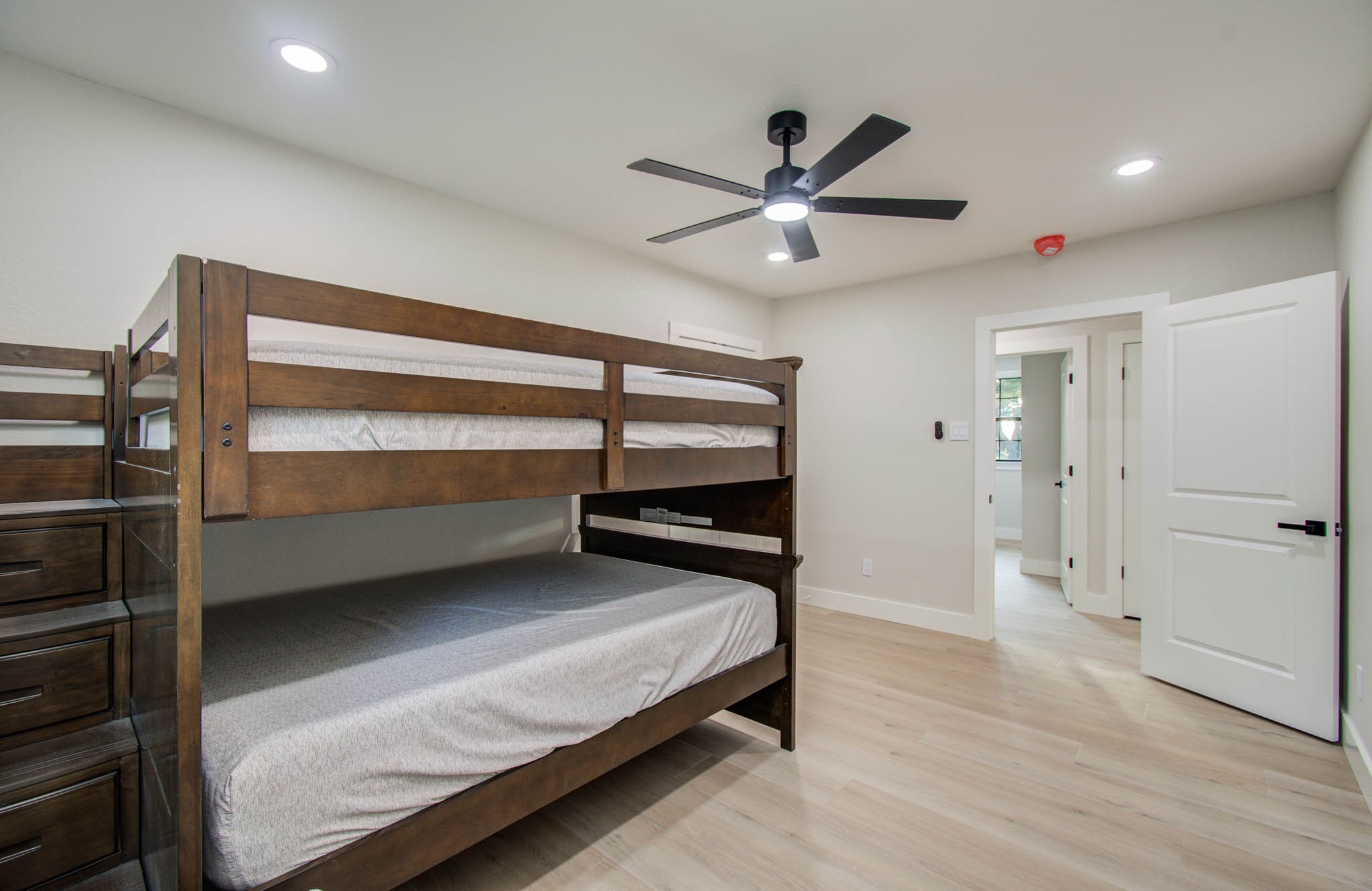 116 Laughlin Road Eagle Lake, TX 77434 - Photo 28 of 41 a bedroom with a bed and a ceiling fan