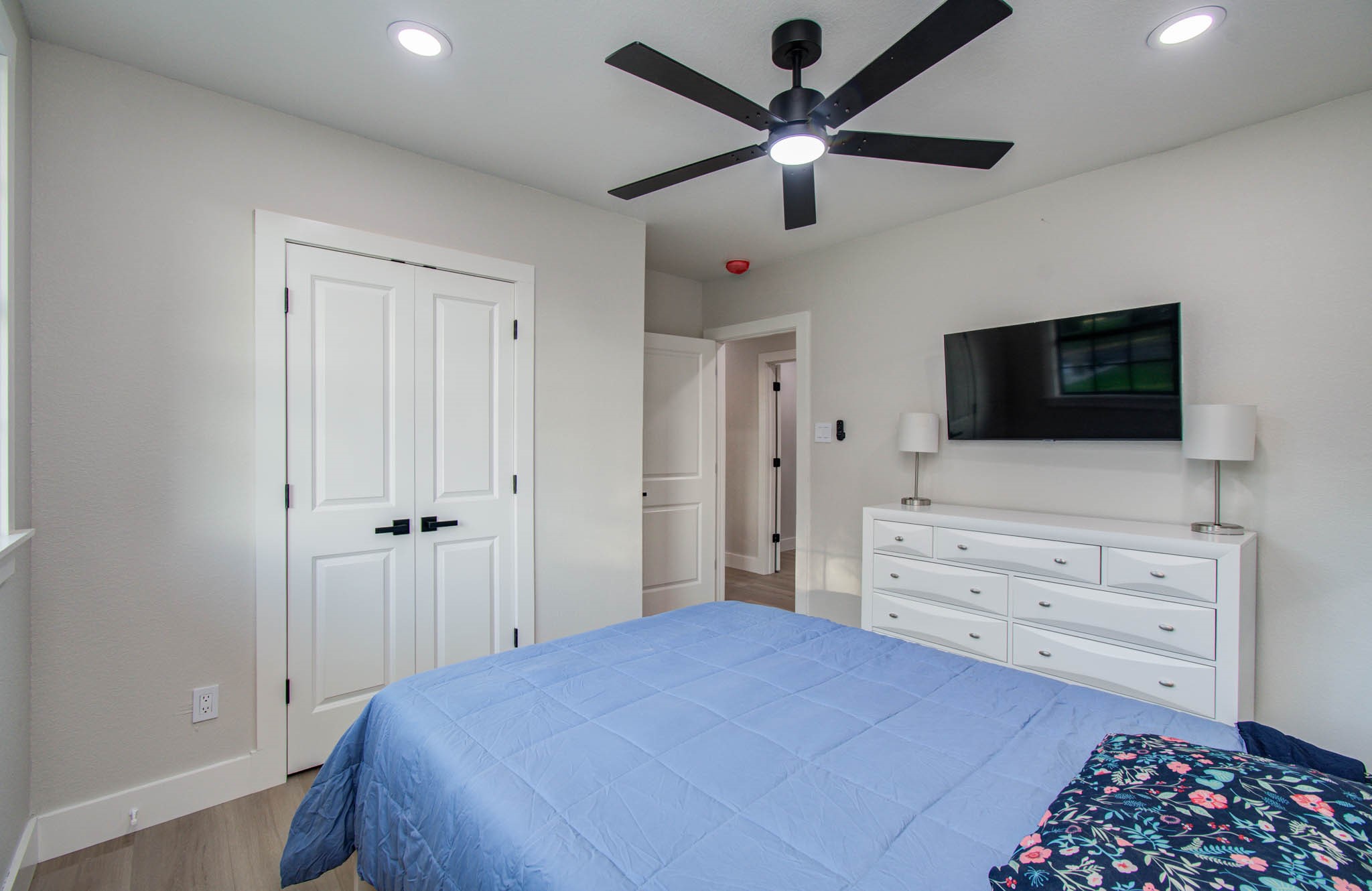 116 Laughlin Road Eagle Lake, TX 77434 - Photo 30 of 41 a bedroom with a bed and a flat screen tv