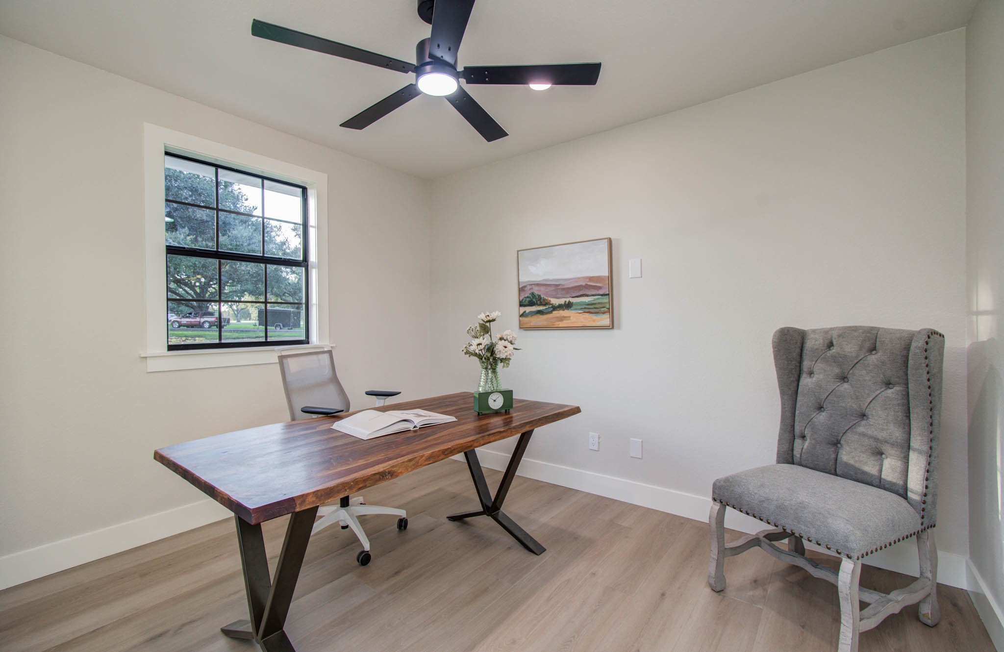 116 Laughlin Road Eagle Lake, TX 77434 - Photo 34 of 41 a view of a workspace with furniture and a window