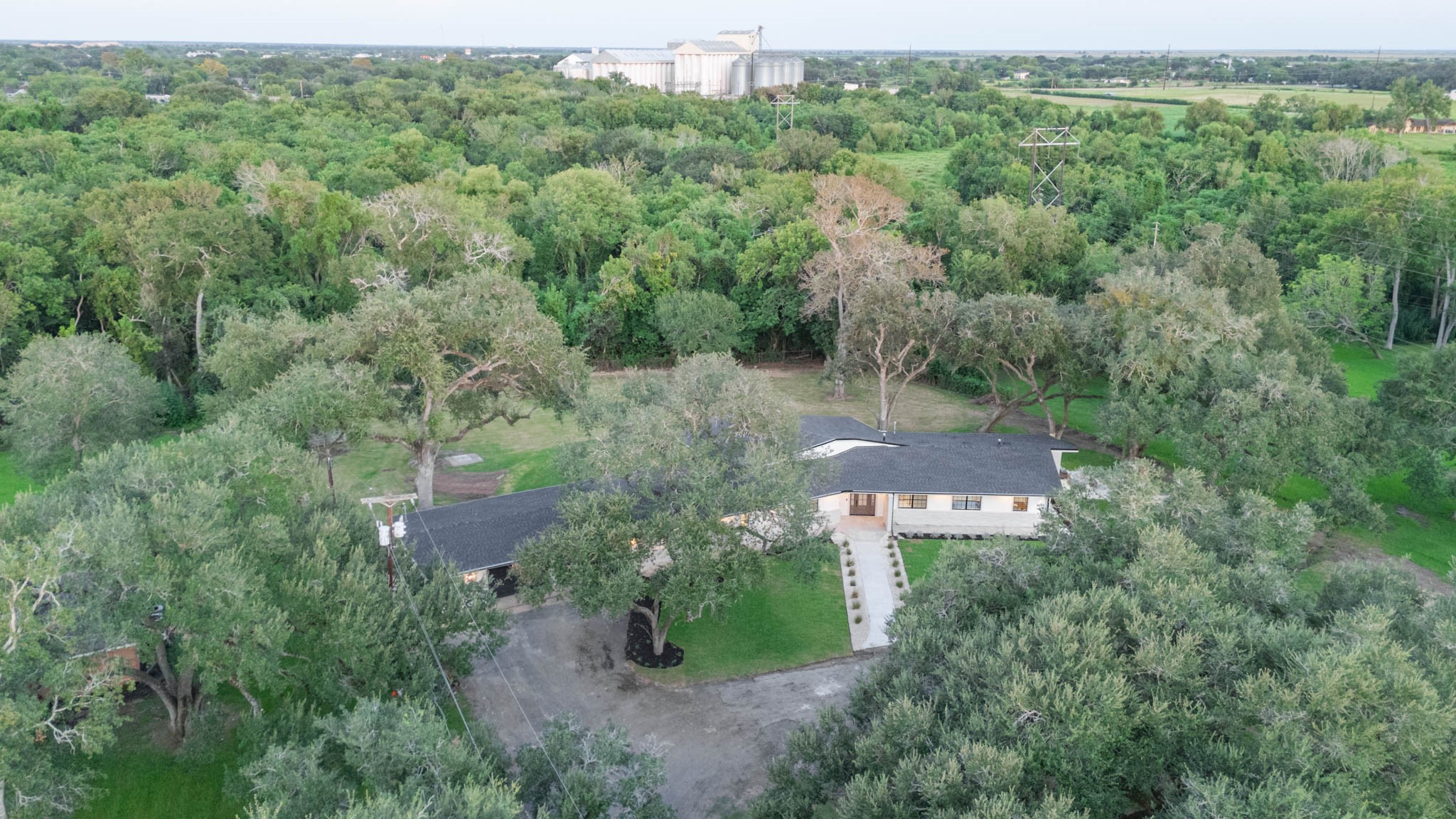 116 Laughlin Road Eagle Lake, TX 77434 - Photo 40 of 41 an aerial view of a house with a yard