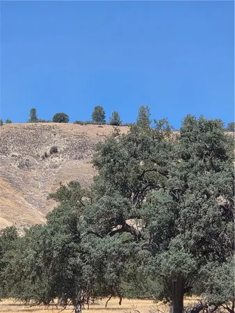 a view of ocean and a mountain