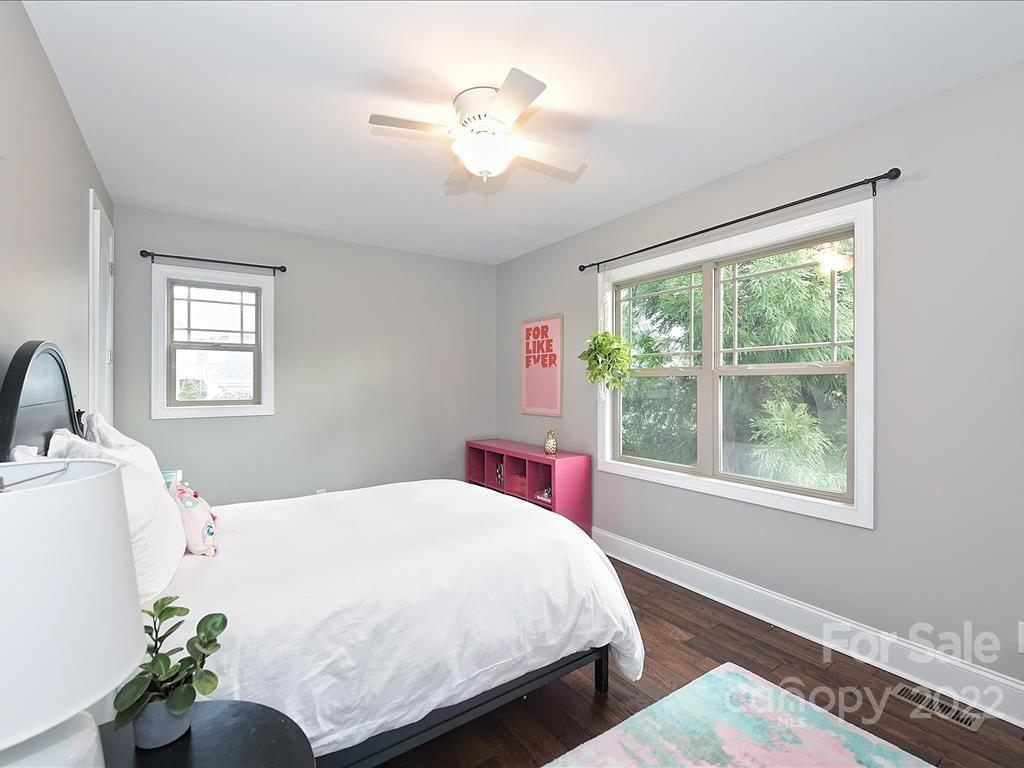 801 Sedgefield Road Charlotte, NC 28209 - Photo 18 of 30 a bedroom with a bed and a window