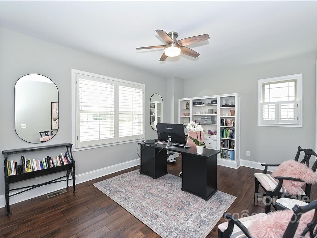 801 Sedgefield Road Charlotte, NC 28209 - Photo 21 of 30 a living room with furniture and a window