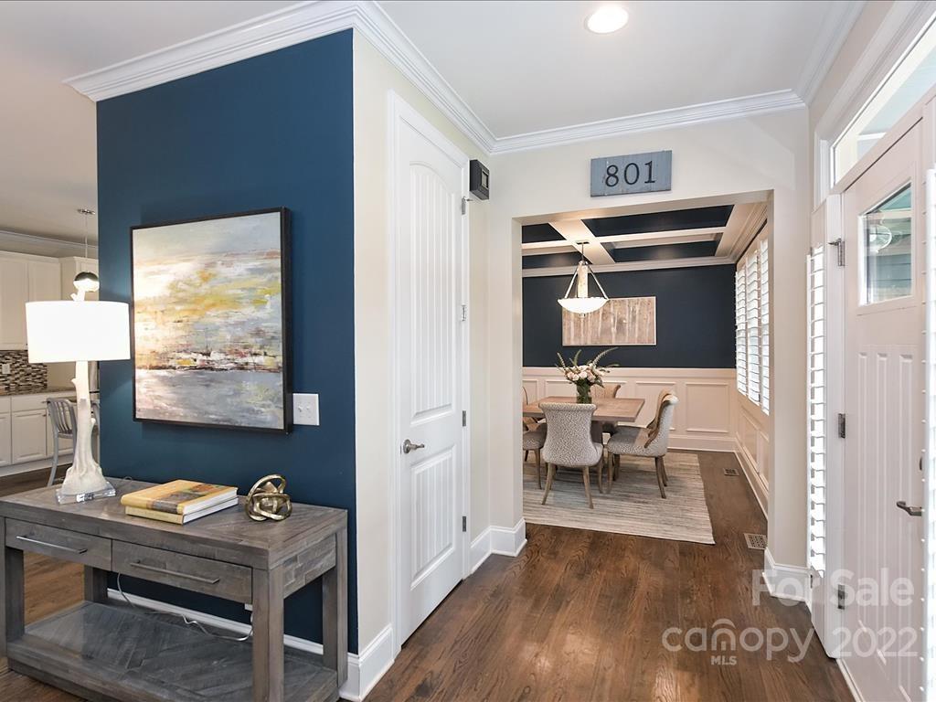801 Sedgefield Road Charlotte, NC 28209 - Photo 9 of 30 a living room with furniture and a flat screen tv