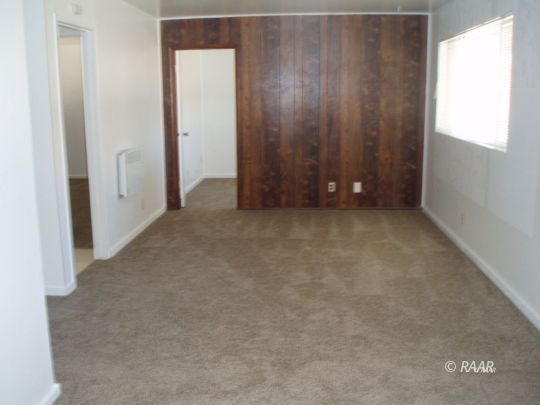 1341 North Garth Street Ridgecrest, CA 93555 - Photo 2 of 8 an empty room with closet
