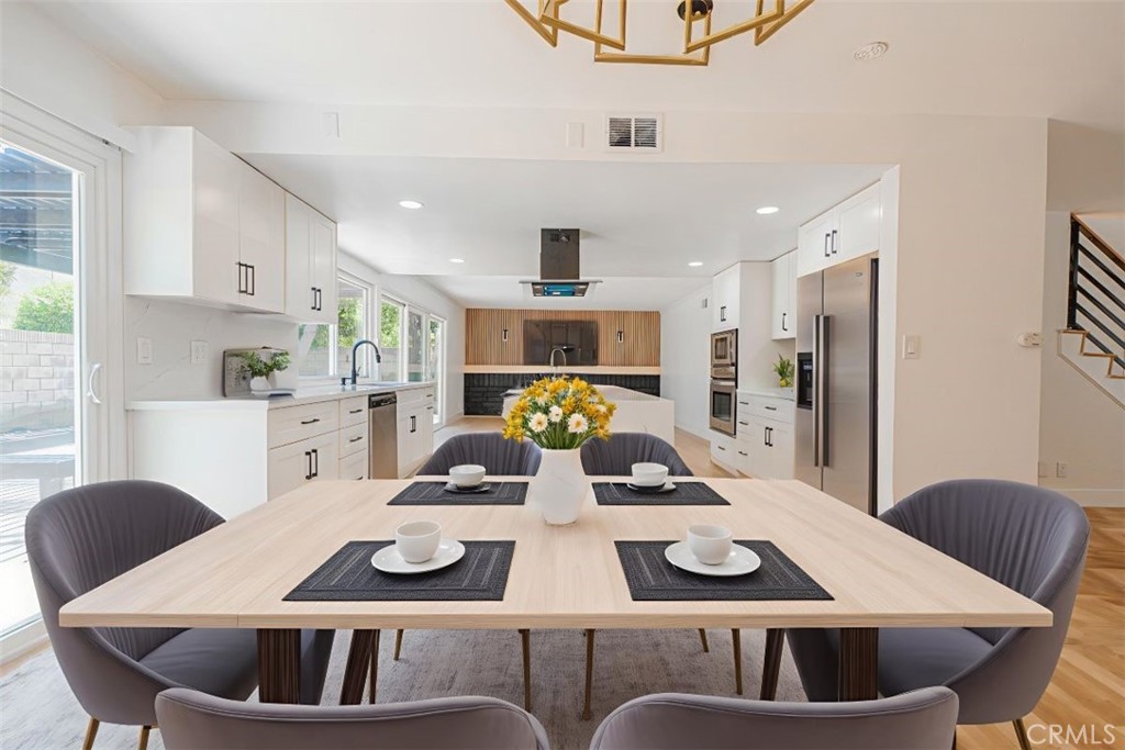 17518 Eric Avenue Cerritos, CA 90703 - Photo 14 of 51 Virtual staging dining area