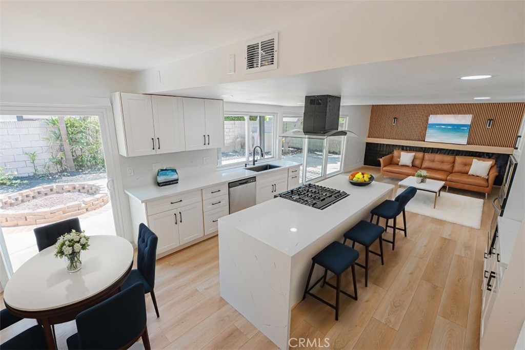 17518 Eric Avenue Cerritos, CA 90703 - Photo 16 of 51 Virtual staging dining area and kitchen