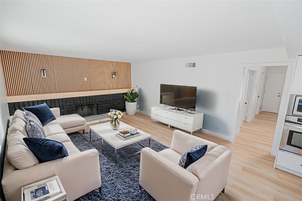 17518 Eric Avenue Cerritos, CA 90703 - Photo 21 of 51 Virtual staging family room