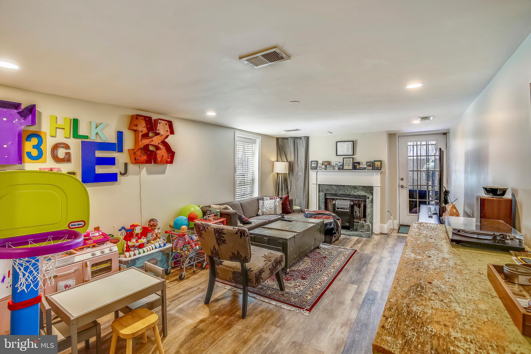 736 11th Street Northeast Washington, DC 20002 - Photo 37 of 43 Unit 2 LL Rec Room/In law suite w/wood burning FP