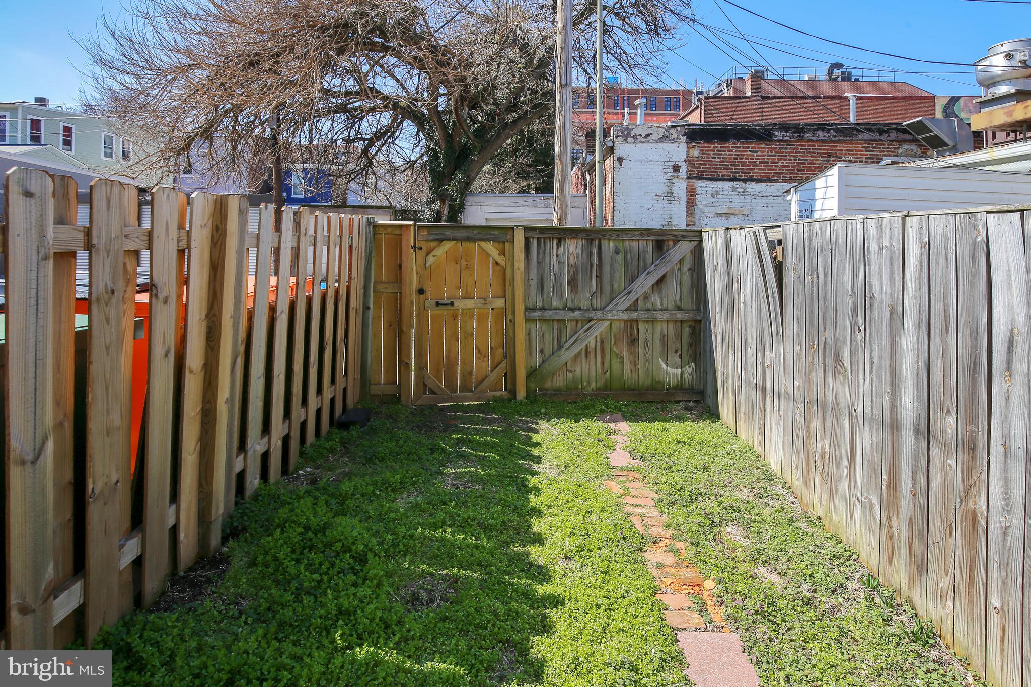 736 11th Street Northeast Washington, DC 20002 - Photo 43 of 43 Rear fenced yard w/ability to park one car