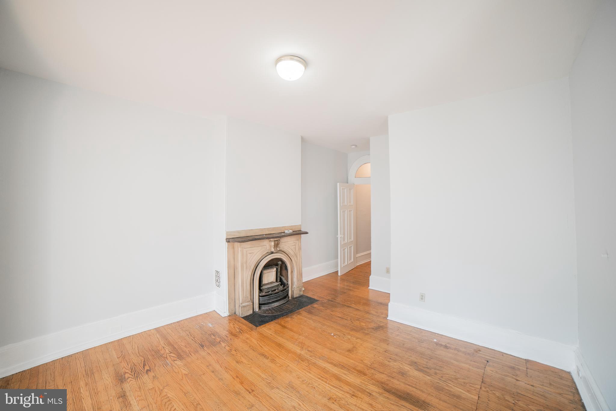 2316 Spruce Street, Unit 2R Philadelphia, PA 19103 - Photo 5 of 11 a view of livingroom with washer and dryer