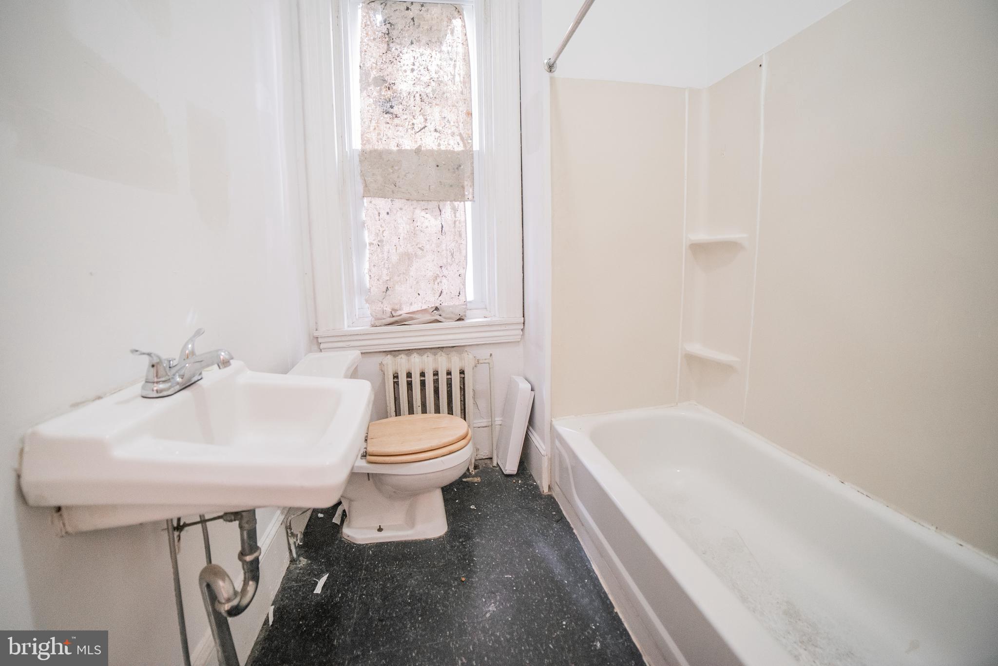 2316 Spruce Street, Unit 2R Philadelphia, PA 19103 - Photo 10 of 11 a bathroom with a sink toilet and bathtub