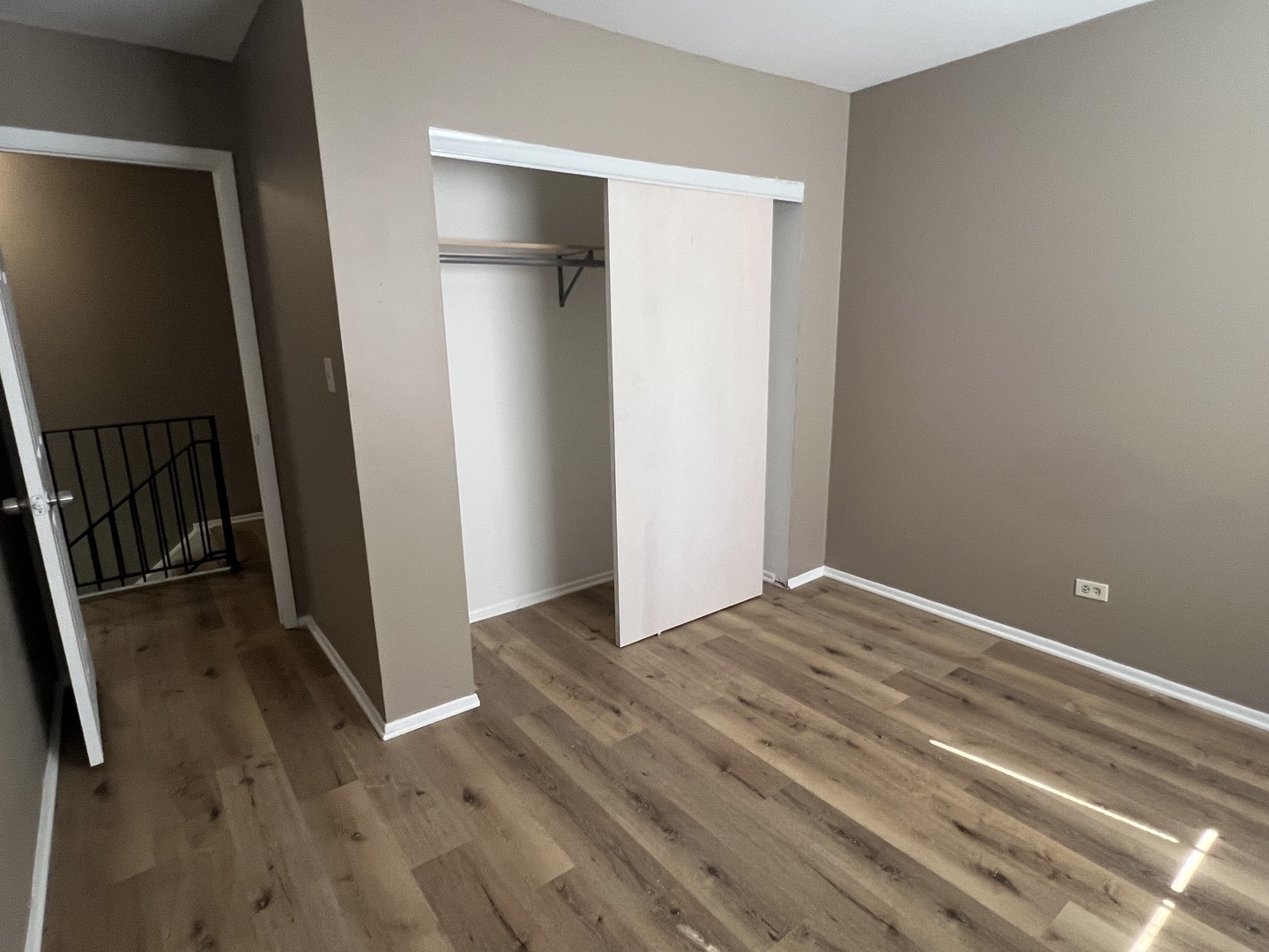2664 Woodview Court, Unit 2664 Waukegan, IL 60087 - Photo 5 of 6 a view of empty room with wooden floor and fan