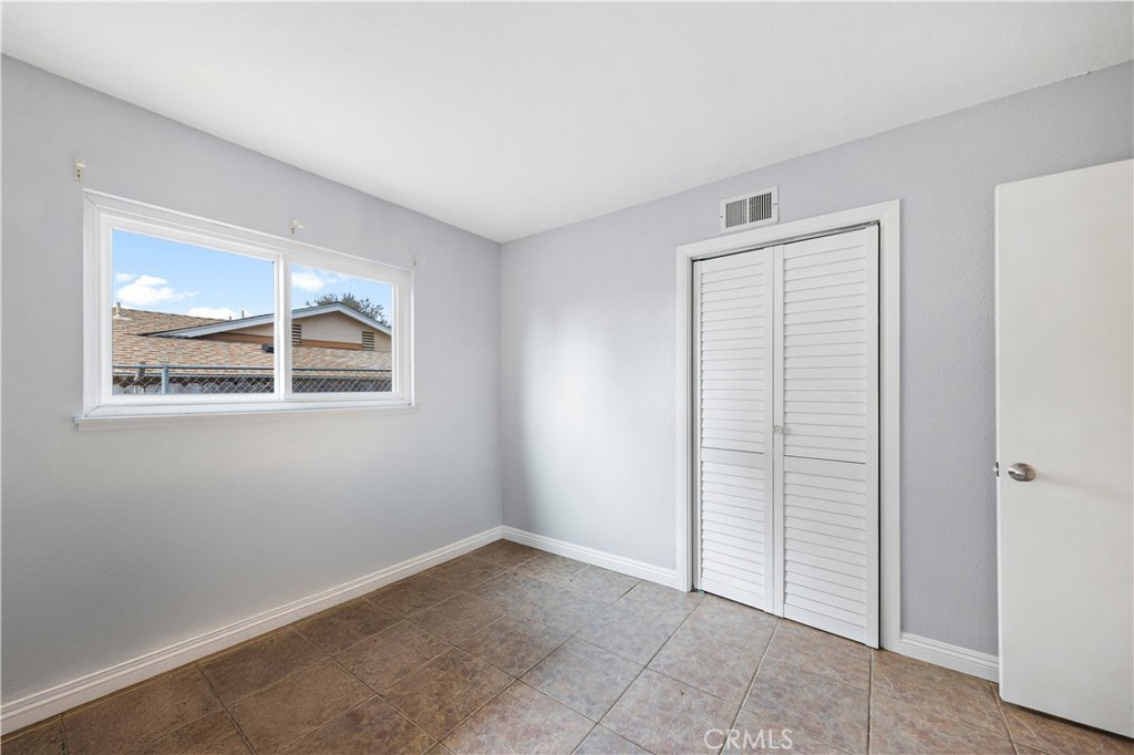 461 West Blaine Street Riverside, CA 92507 - Photo 15 of 22 an empty room with windows
