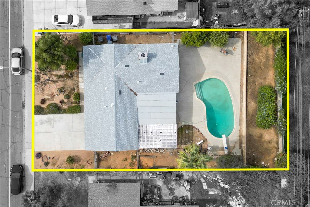 461 West Blaine Street Riverside, CA 92507 - Photo 20 of 22 a view of swimming pool with a yard