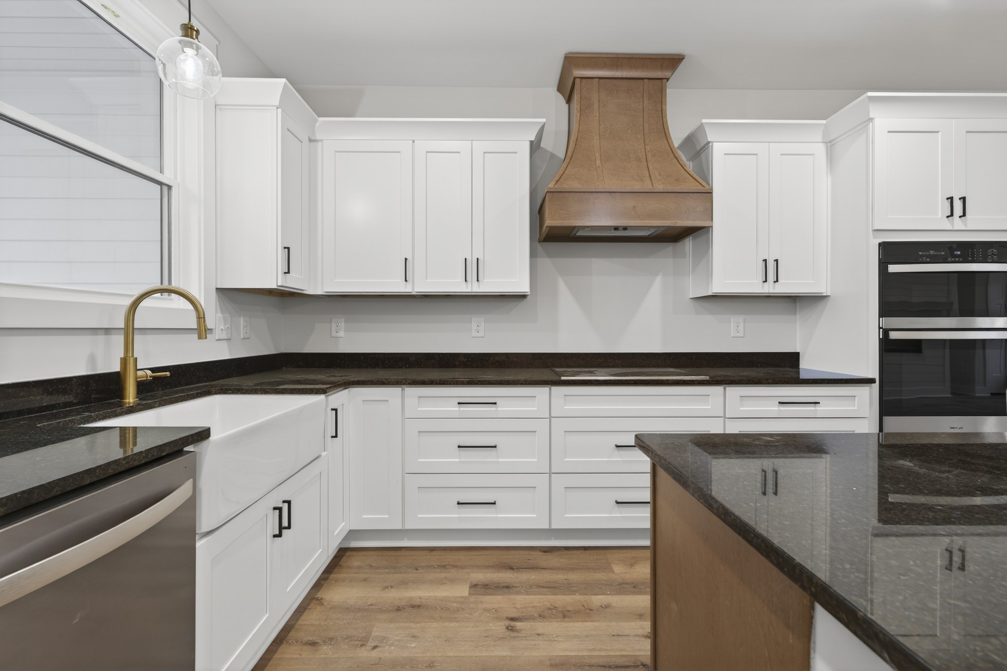 777 Rock Springs Road Castalian Springs, TN 37031 - Photo 12 of 56 a kitchen with stainless steel appliances white cabinets and a sink