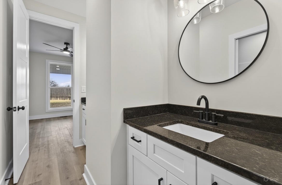 777 Rock Springs Road Castalian Springs, TN 37031 - Photo 16 of 56 a bathroom with a sink and a mirror