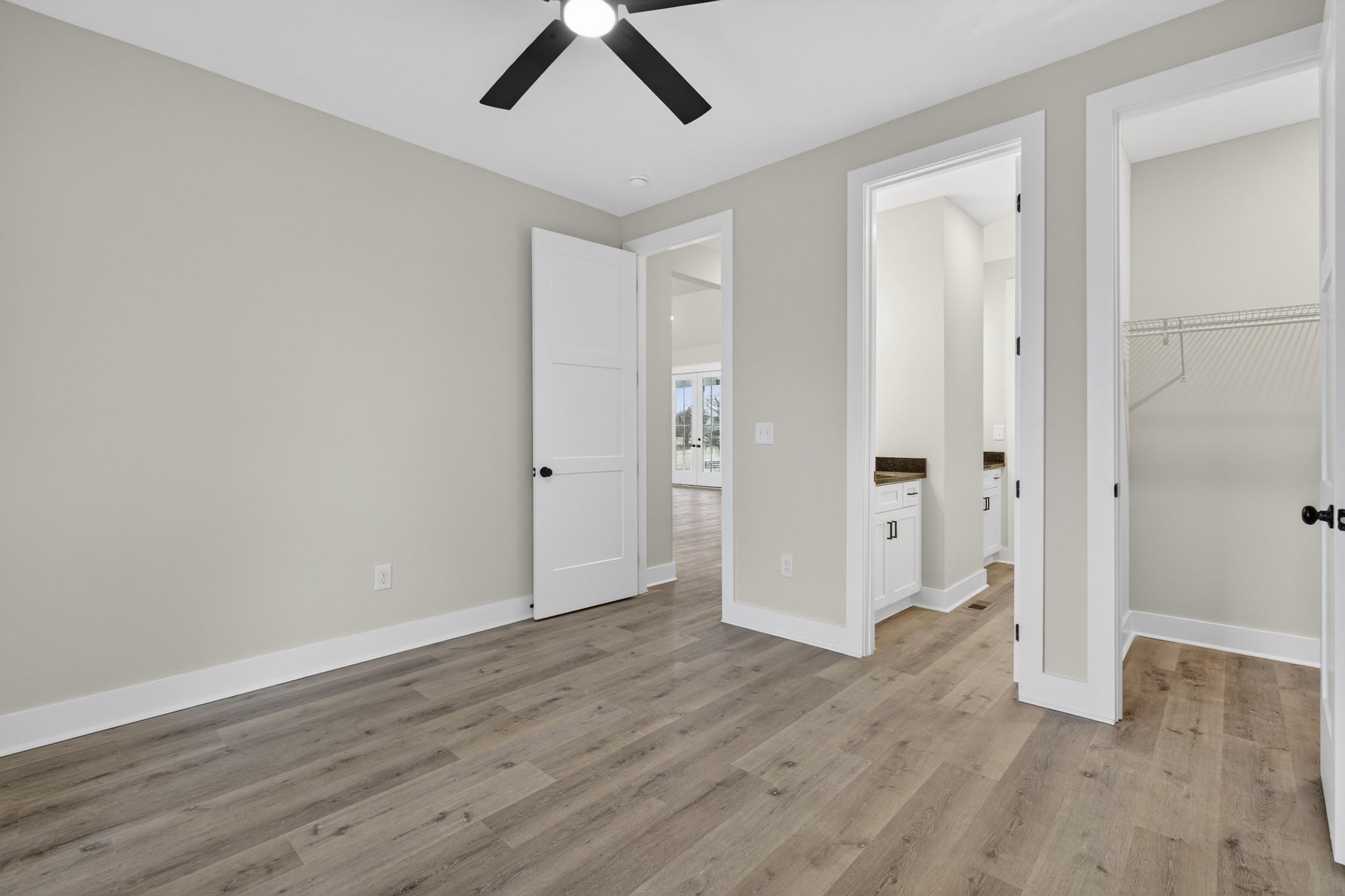 777 Rock Springs Road Castalian Springs, TN 37031 - Photo 18 of 56 a view of an empty room with wooden floor