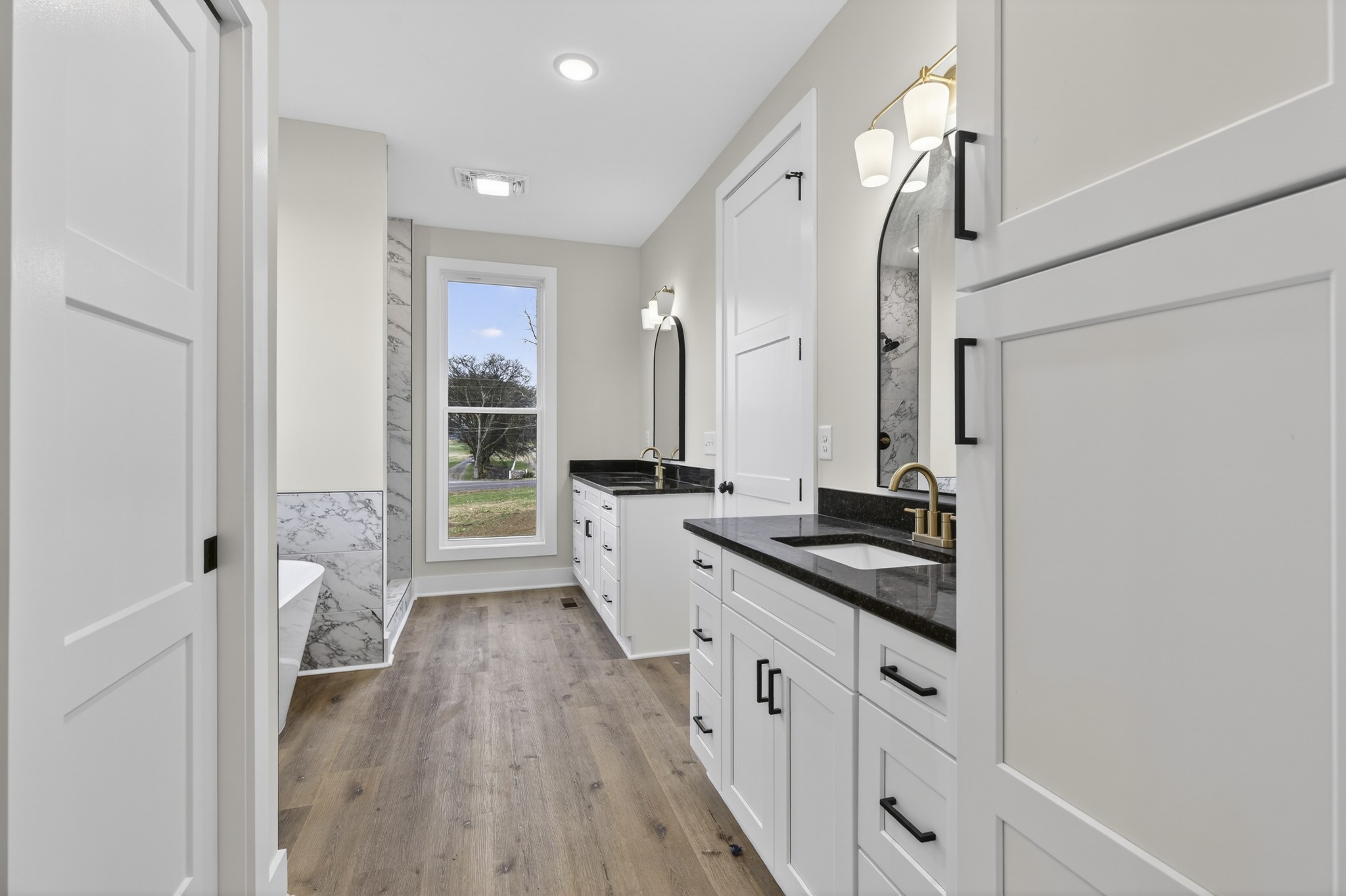 777 Rock Springs Road Castalian Springs, TN 37031 - Photo 22 of 56 a kitchen with granite countertop a sink stove and refrigerator
