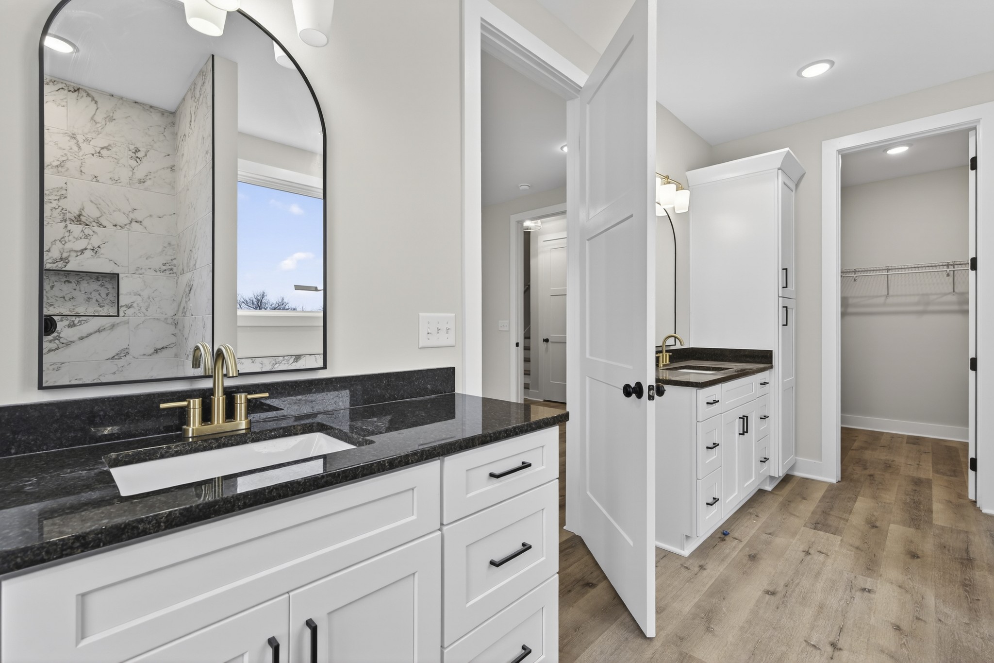777 Rock Springs Road Castalian Springs, TN 37031 - Photo 25 of 56 a bathroom with a double vanity sink mirror and double