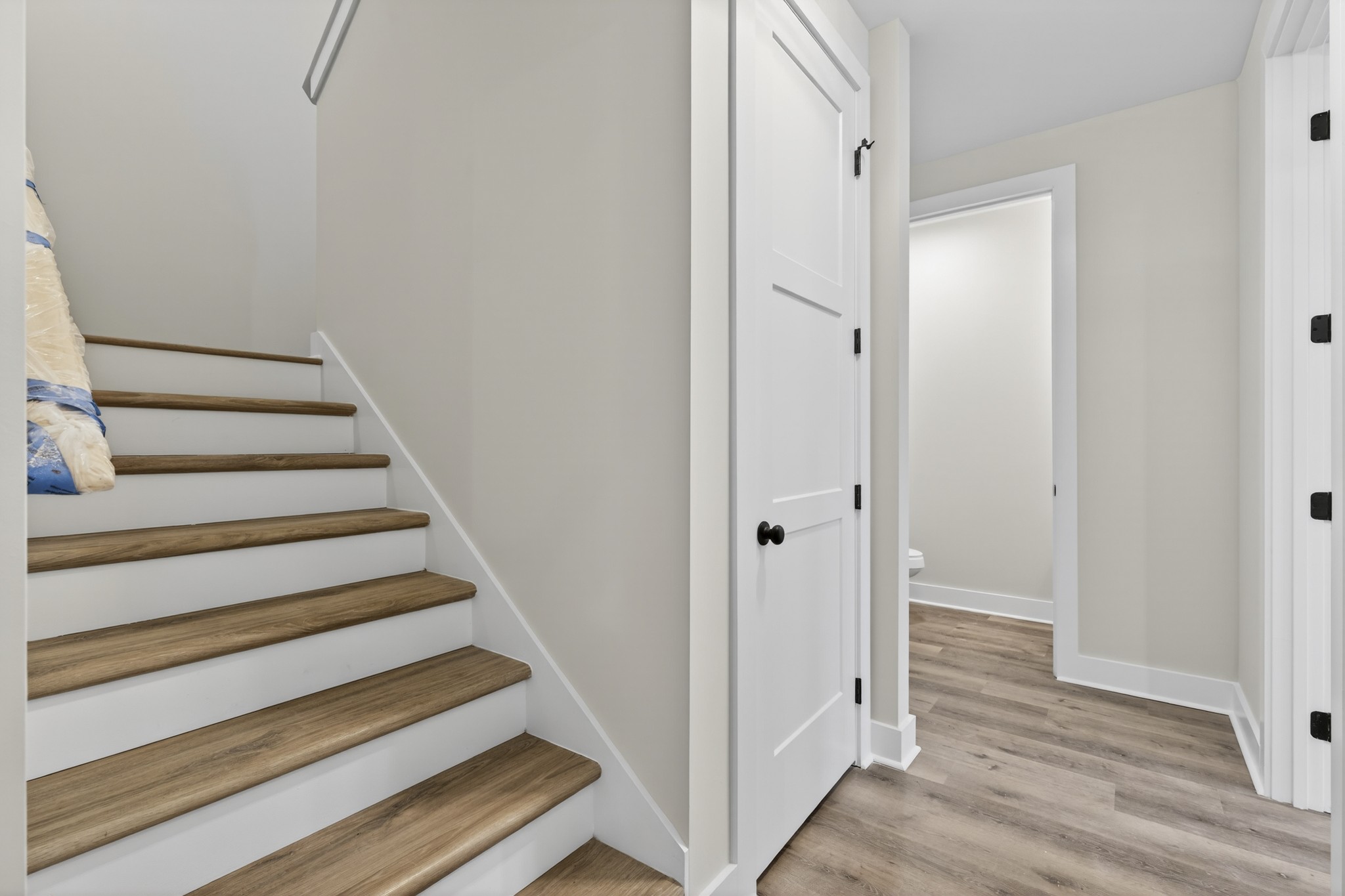 777 Rock Springs Road Castalian Springs, TN 37031 - Photo 30 of 56 a view of a hallway with wooden floor and entryway