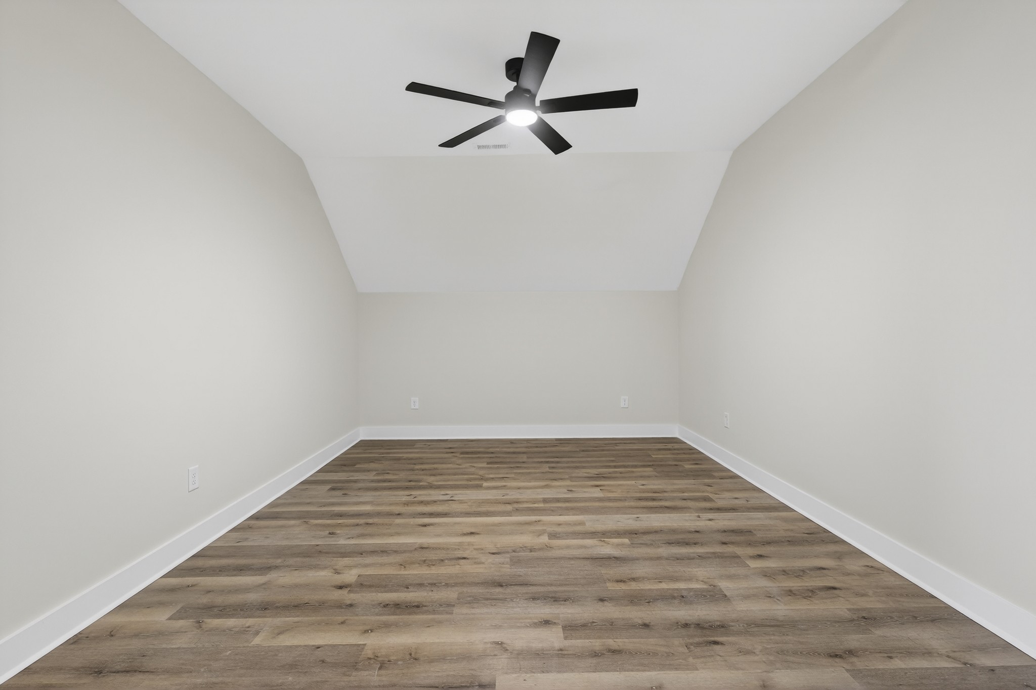 777 Rock Springs Road Castalian Springs, TN 37031 - Photo 31 of 56 a view of a room with wooden floor and a ceiling fan