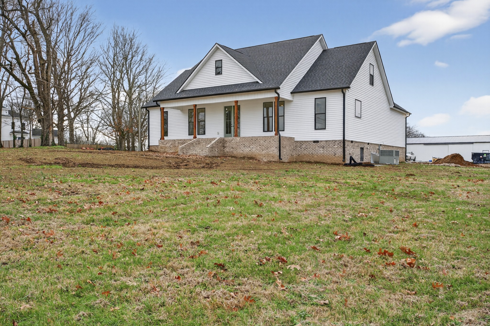 777 Rock Springs Road Castalian Springs, TN 37031 - Photo 40 of 56 a big house with a big yard and more windows