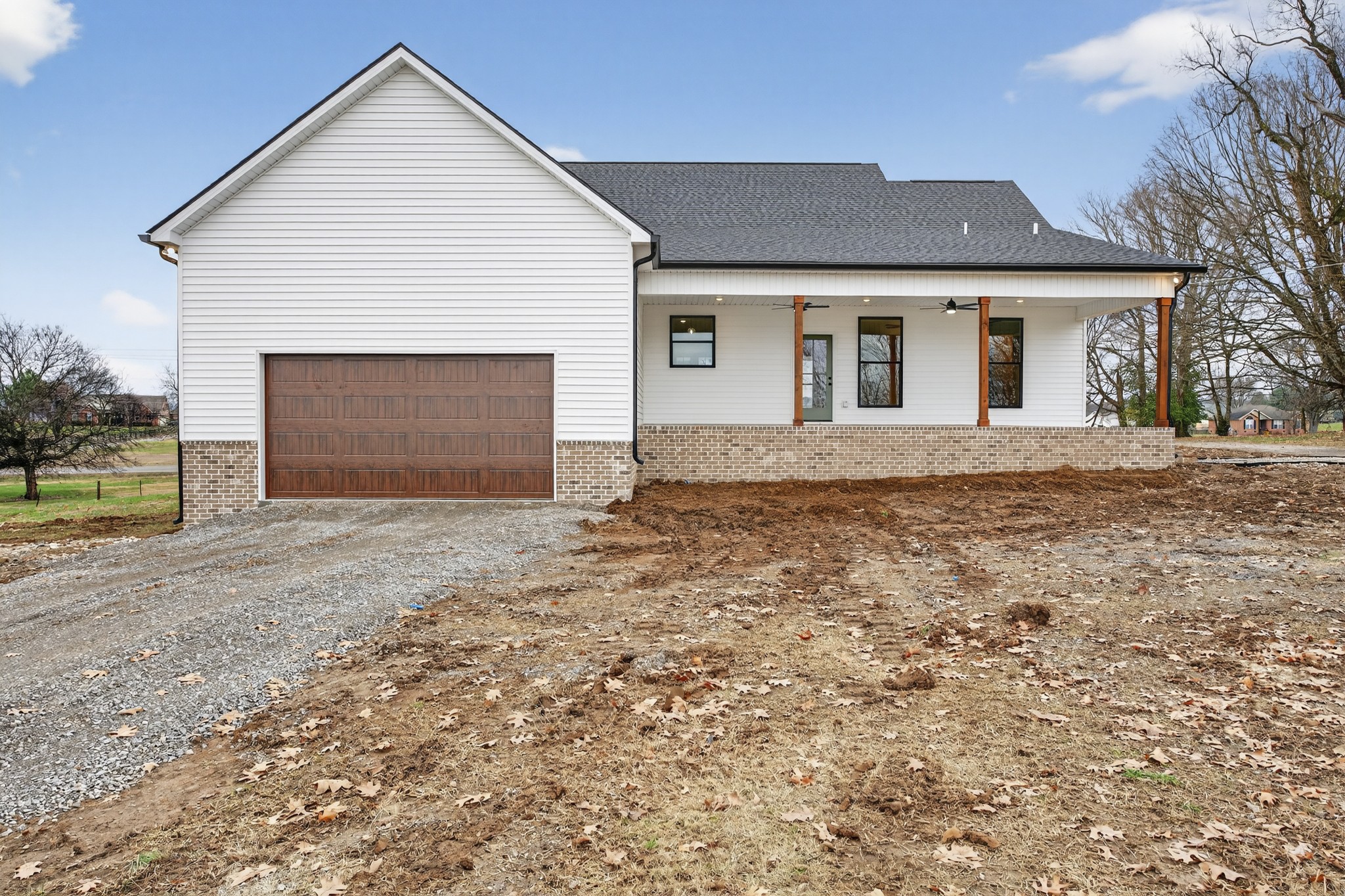 777 Rock Springs Road Castalian Springs, TN 37031 - Photo 47 of 56 front view of a house and a yard