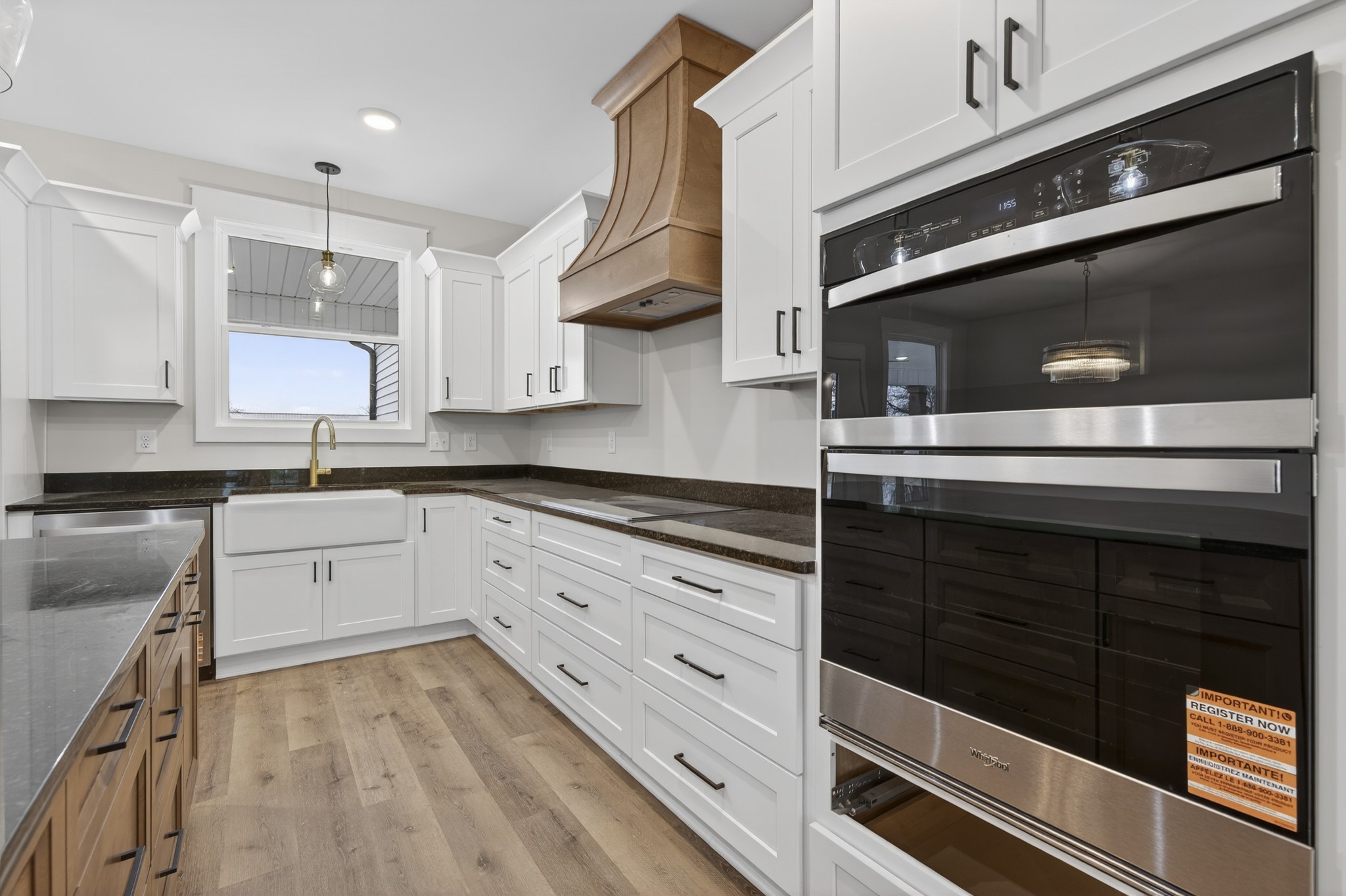 777 Rock Springs Road Castalian Springs, TN 37031 - Photo 10 of 56 a kitchen with granite countertop white cabinets and appliances