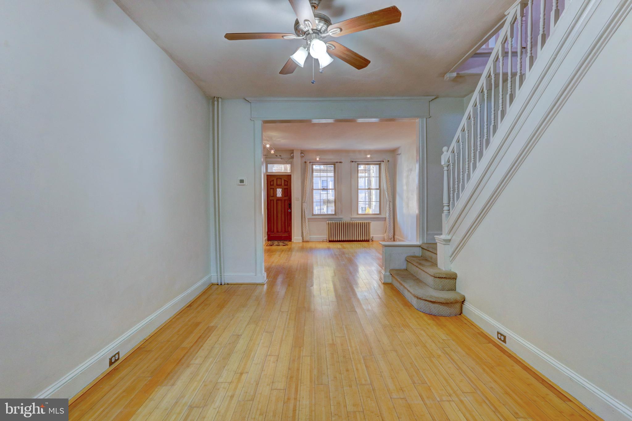 112 Vassar Street Philadelphia, PA 19128 - Photo 33 of 33 a view of livingroom with furniture wooden floor and front door