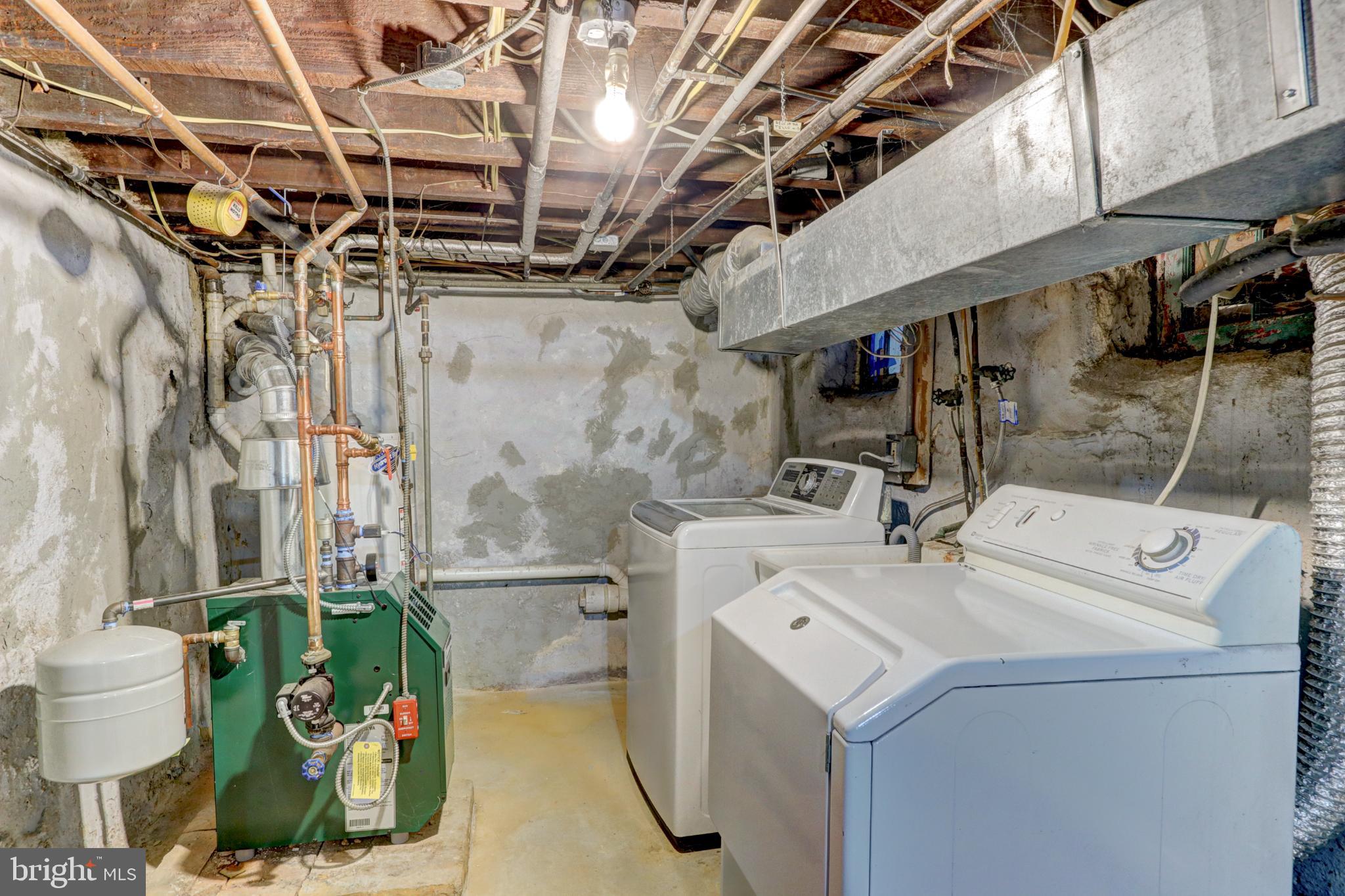 112 Vassar Street Philadelphia, PA 19128 - Photo 32 of 33 a utility room with a washer and dryer