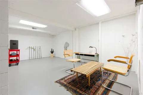 a living room with a rug