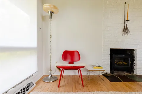 a room with a table and chairs