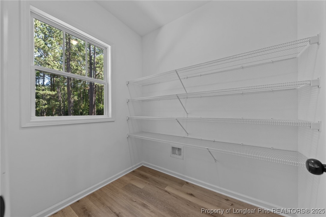 15880 Fox Lane Wagram, NC 28396 - Photo 14 of 33 a view of a small space with racks on the wall