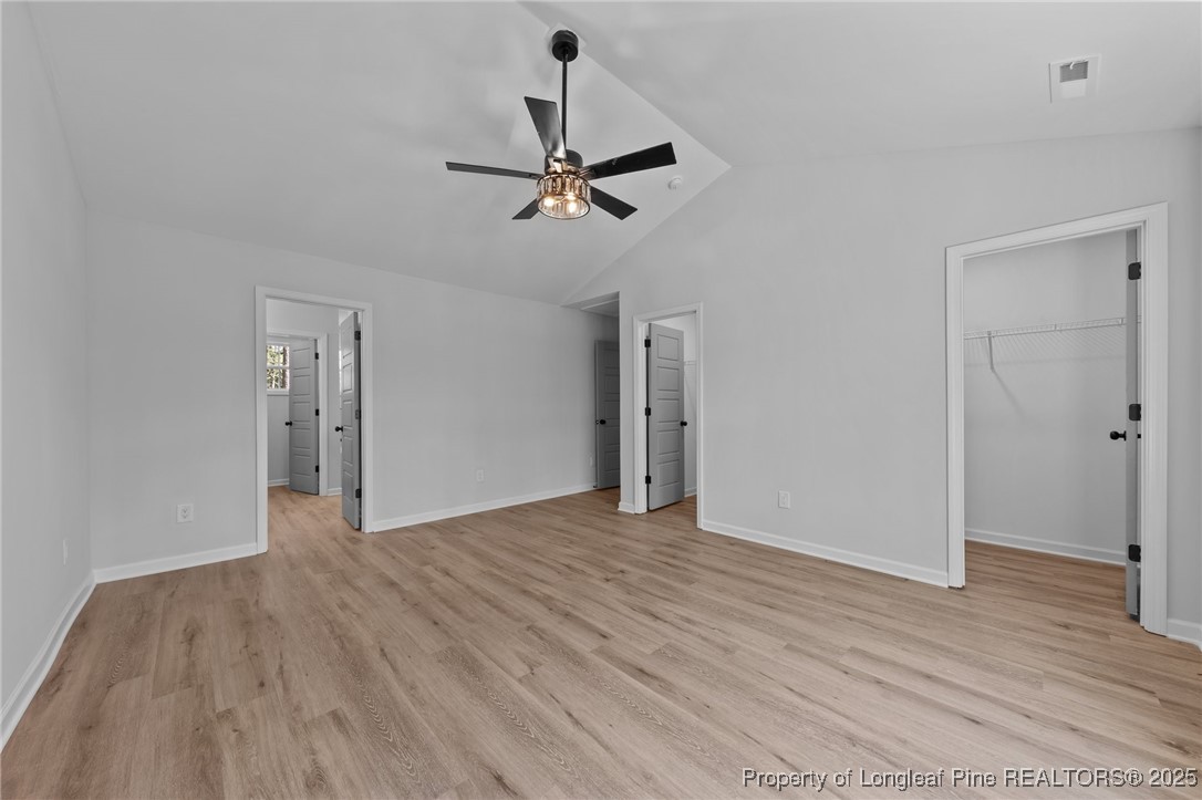 15880 Fox Lane Wagram, NC 28396 - Photo 16 of 33 a view of an empty room with wooden floor
