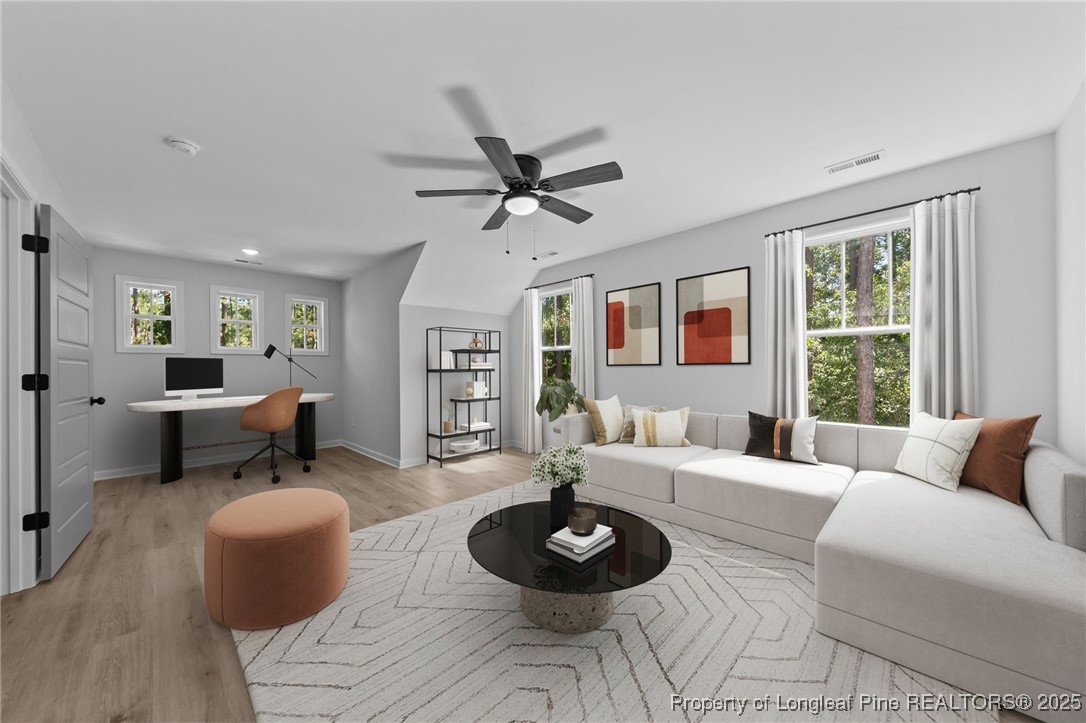 15880 Fox Lane Wagram, NC 28396 - Photo 21 of 33 a living room with furniture and a large window