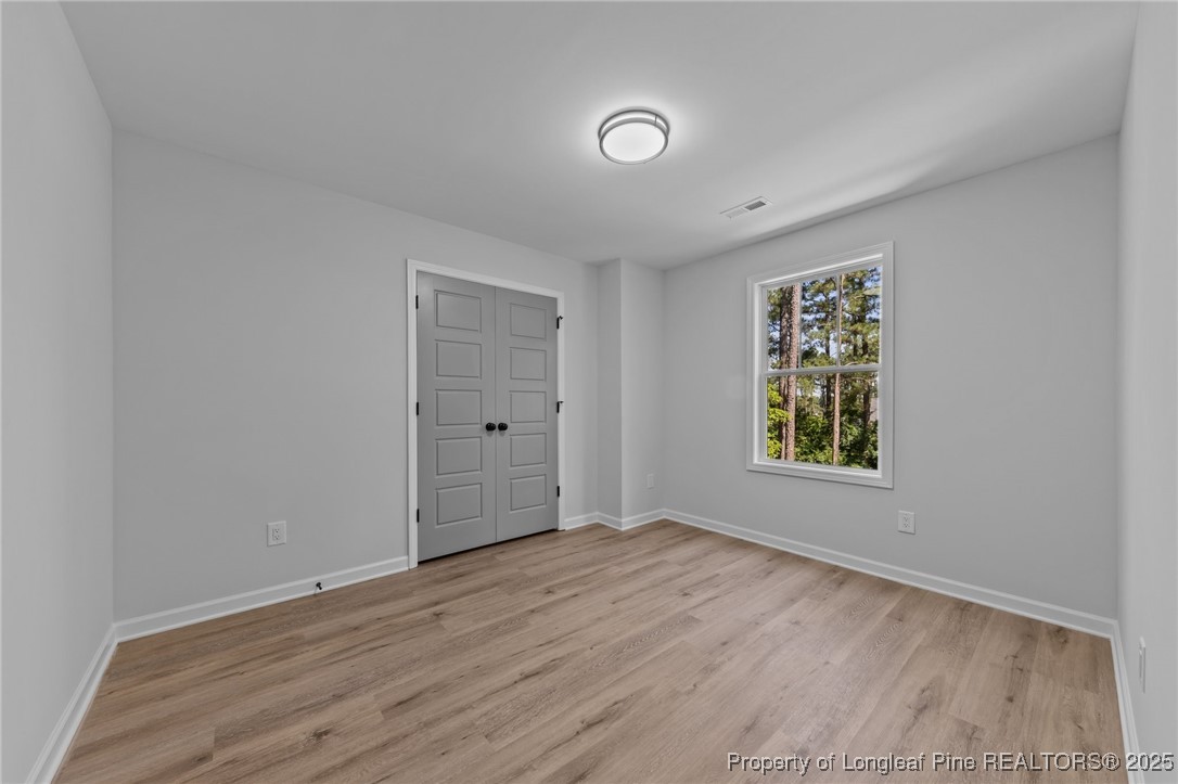 15880 Fox Lane Wagram, NC 28396 - Photo 22 of 33 an empty room with window and windows
